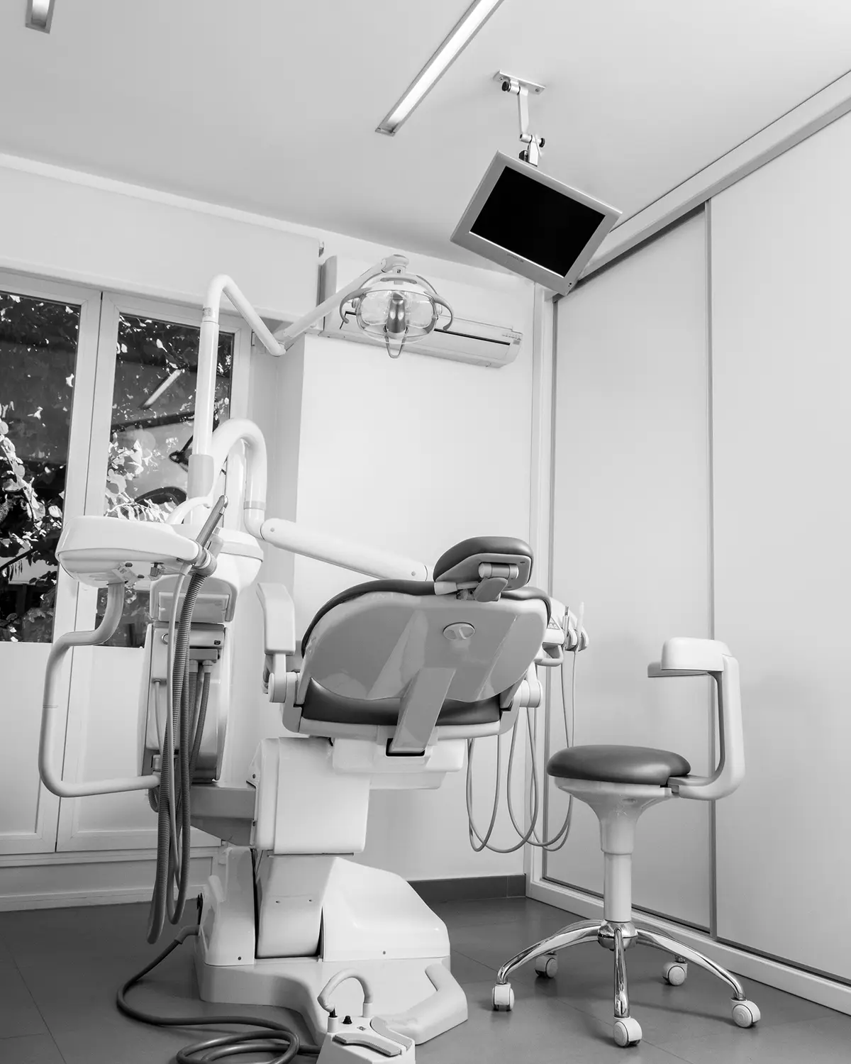 Treatment room with chair and stool